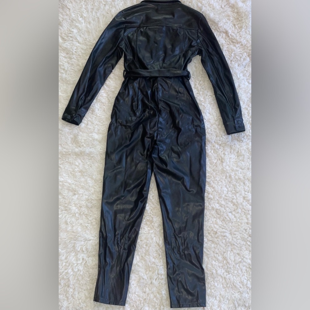 Never worn. PRETTYLITTLETHING Petite Black Zip Up Faux Leather Jumpsuit